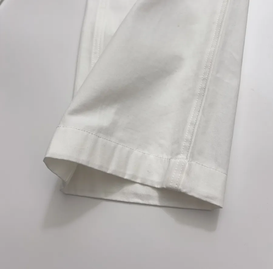 Ivory High-Waist Pleated Tapered Trousers in Off-White, product view 11