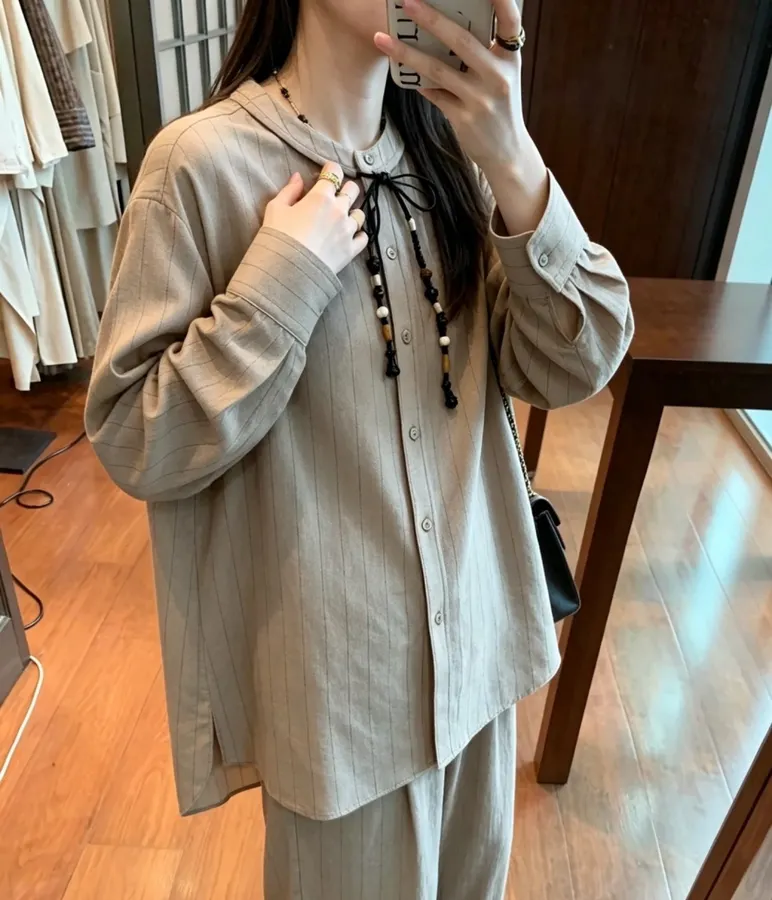 Niche Round-Neck Striped Jacquard Loose Wool Shirt with Wooden Bead Tassel in Taupe, product view 01