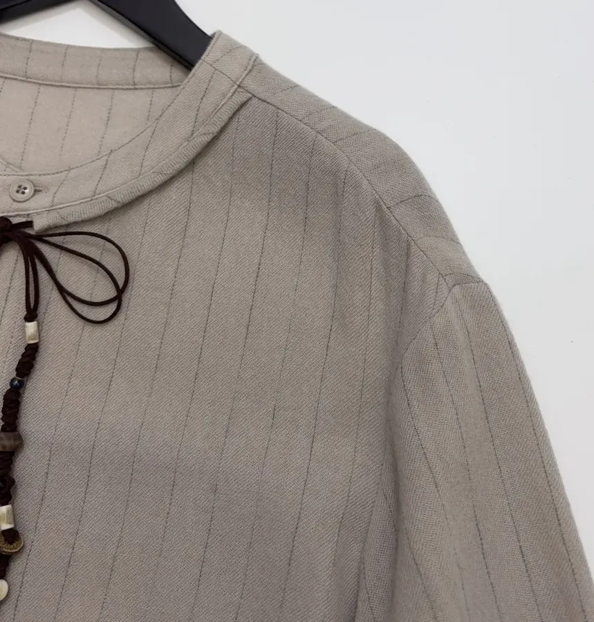 Niche Round-Neck Striped Jacquard Loose Wool Shirt with Wooden Bead Tassel in Taupe, product view 04