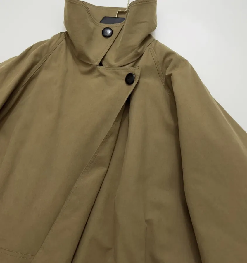 The Row Cotton Aurore trench coat with structured silhouette, diagonal front closure, and three-quarter sleeves in As Shown, product view 03