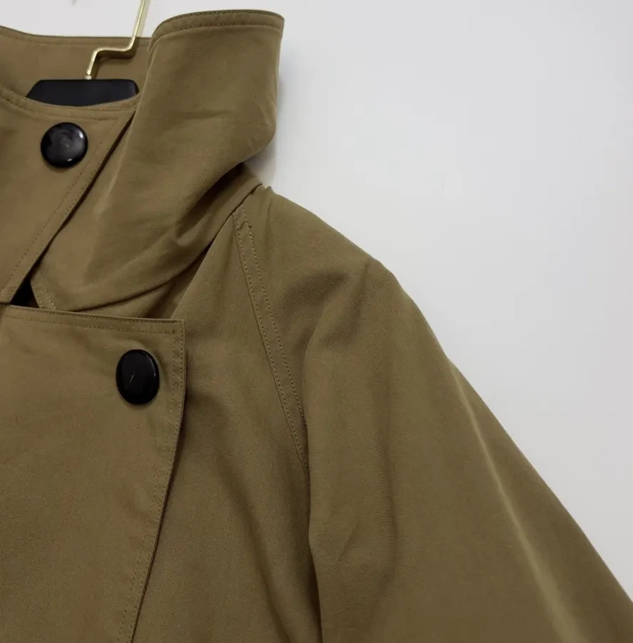 The Row Cotton Aurore trench coat with structured silhouette, diagonal front closure, and three-quarter sleeves in As Shown, product view 05