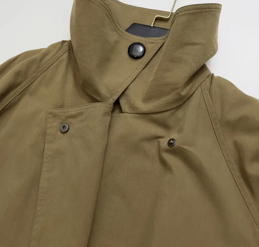 The Row Cotton Aurore trench coat with structured silhouette, diagonal front closure, and three-quarter sleeves in As Shown, product view 06