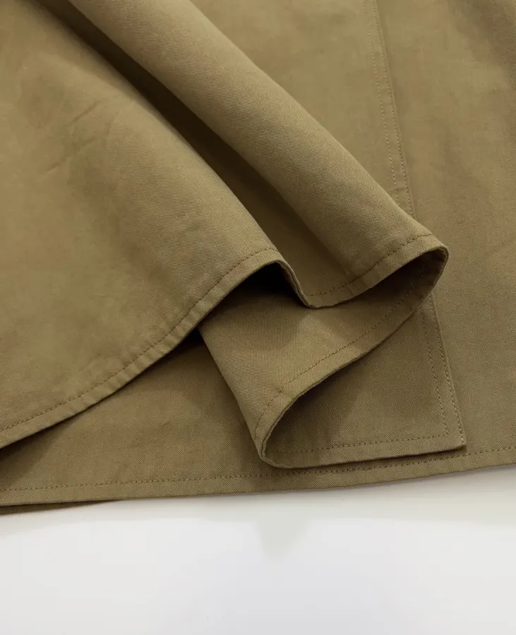 The Row Cotton Aurore trench coat with structured silhouette, diagonal front closure, and three-quarter sleeves in As Shown, product view 15