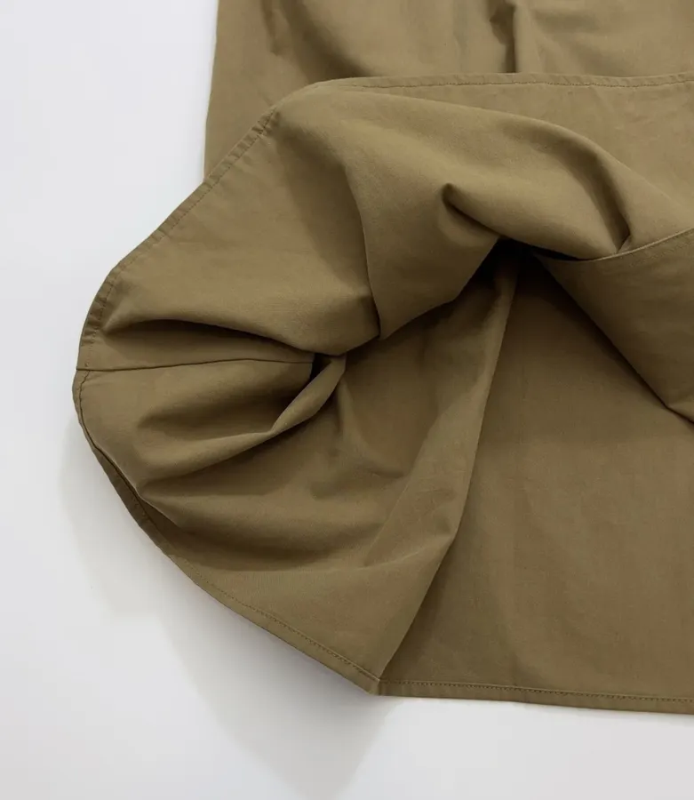 The Row Cotton Aurore trench coat with structured silhouette, diagonal front closure, and three-quarter sleeves in As Shown, product view 16