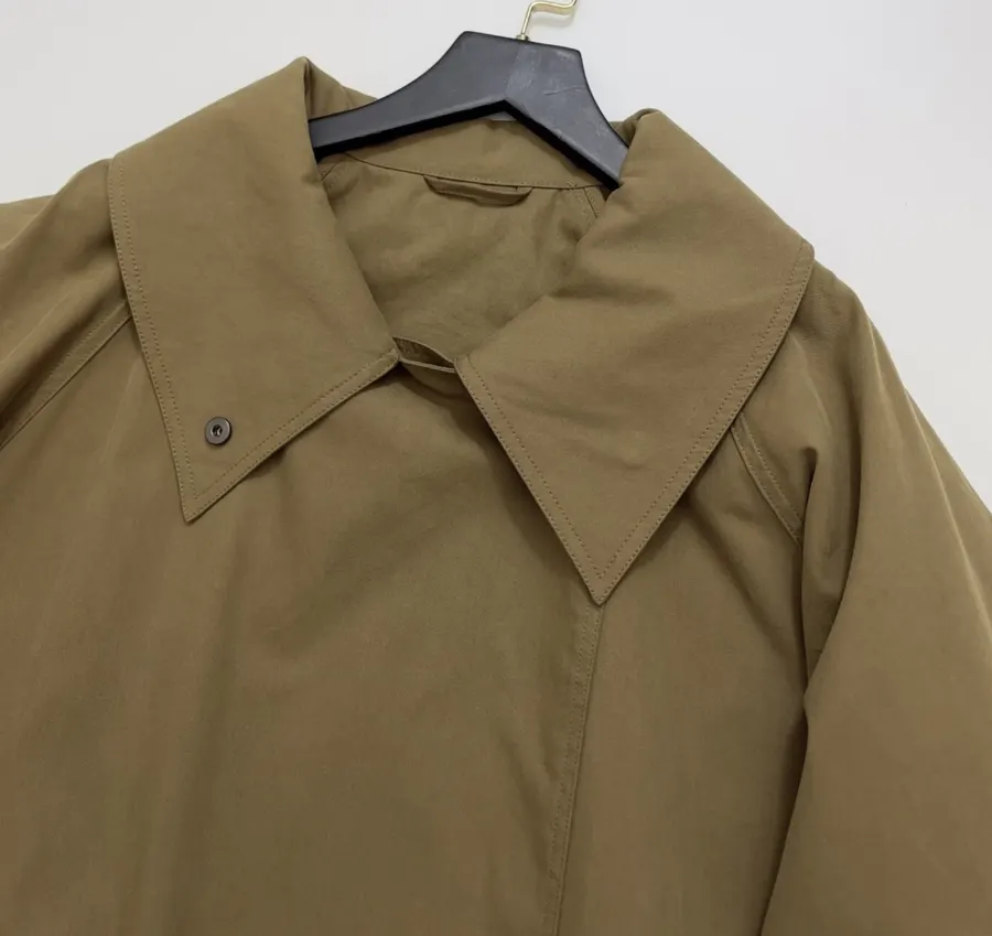 The Row Cotton Aurore trench coat with structured silhouette, diagonal front closure, and three-quarter sleeves in As Shown, product view 20