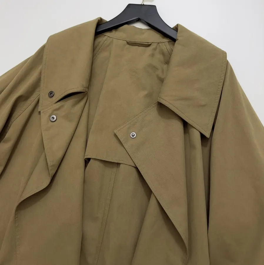 The Row Cotton Aurore trench coat with structured silhouette, diagonal front closure, and three-quarter sleeves in As Shown, product view 21