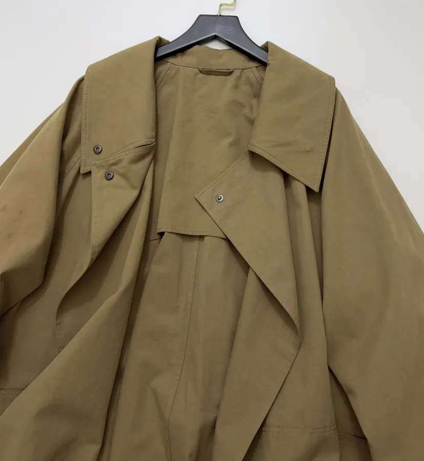 The Row Cotton Aurore trench coat with structured silhouette, diagonal front closure, and three-quarter sleeves in As Shown, product view 23