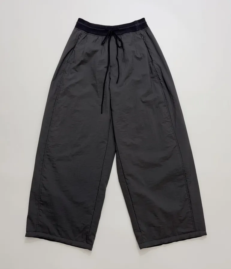 Lightweight warm cotton-style trousers with seaming details, drawstring waist, relaxed straight leg and tapered ankle in As Shown, product view