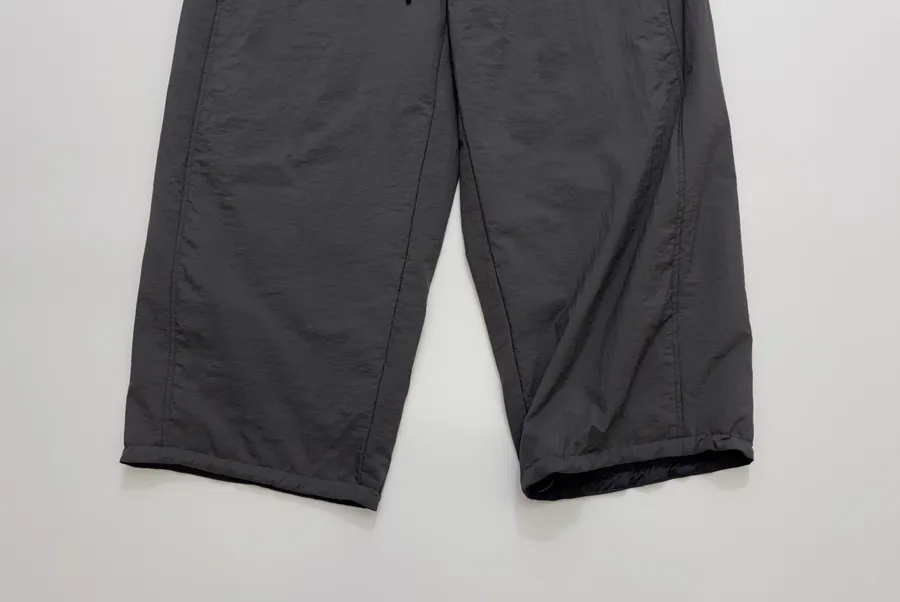 Lightweight warm cotton-style trousers with seaming details, drawstring waist, relaxed straight leg and tapered ankle in As Shown, product view 09