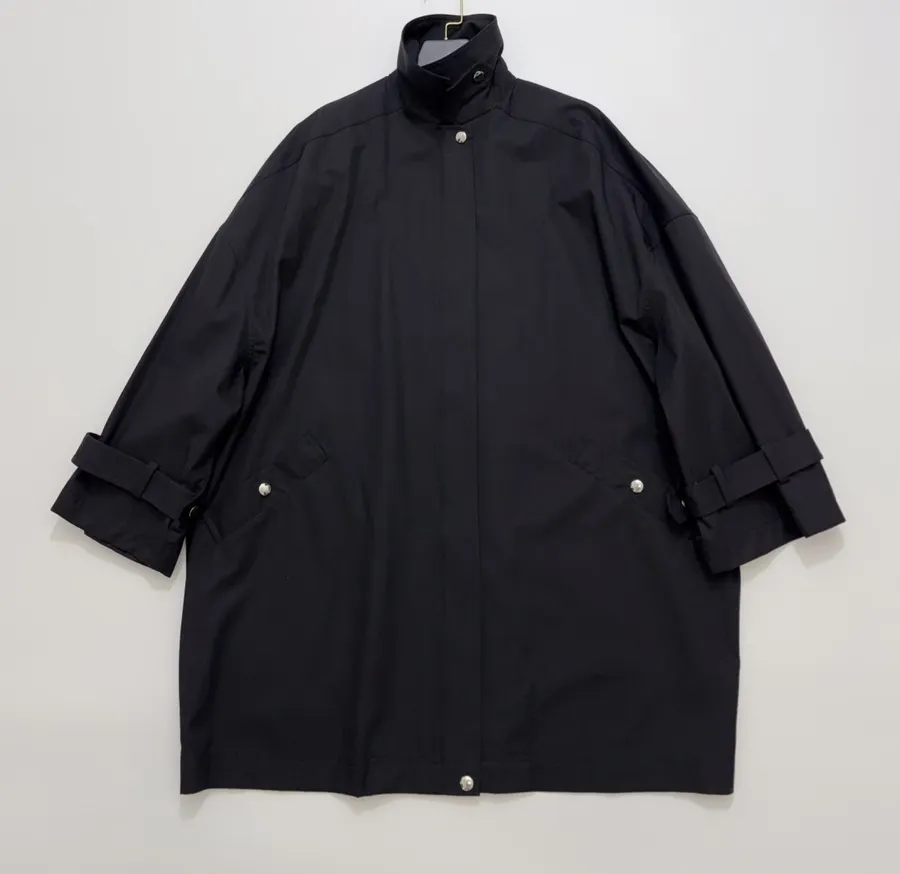 Totême Structured lightweight trench coat with stand-up collar, zip front, and dropped shoulders in As Shown, product view