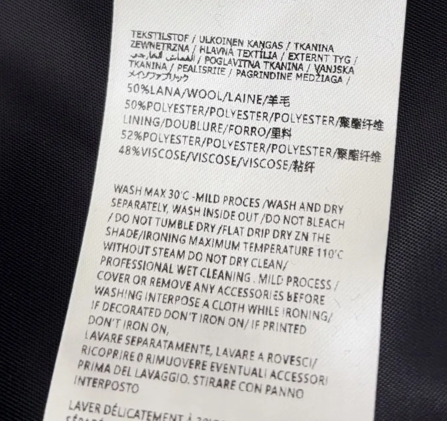 MM6 Maison Margiela Wool-blend tailored coat with notch lapel, single-button, dropped shoulders, mid-length, relaxed fit in As Shown, product view 20