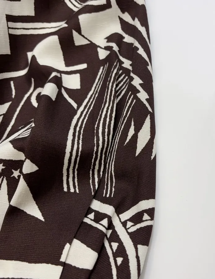 ALEMAIS Black and Ivory Geometric-Print Longline Shirt in Black and Ivory, product view 09